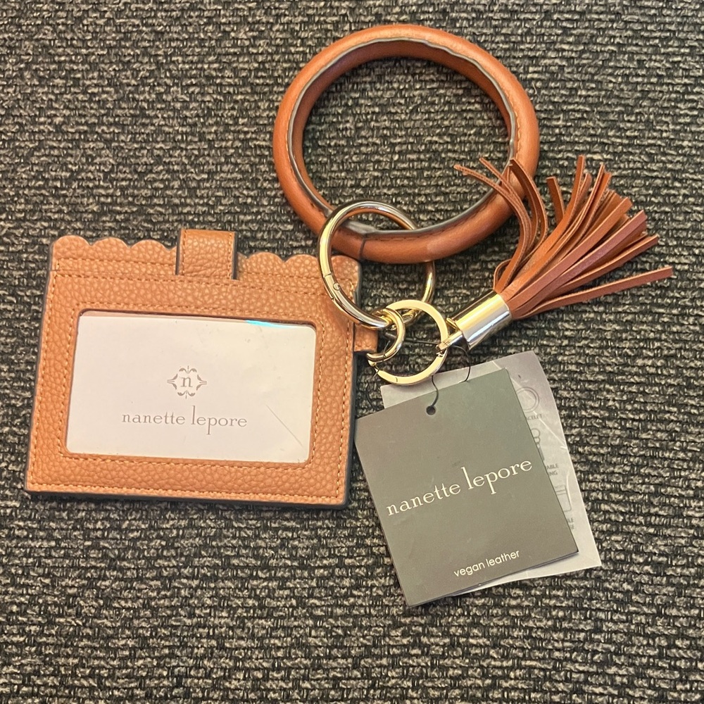 Nanette Lepore CC case w/ ring bracelet and remove able key ring charm vegan
